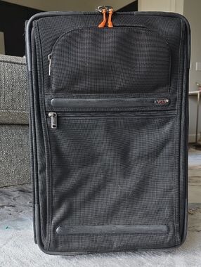 Tumi carry on suitcase black